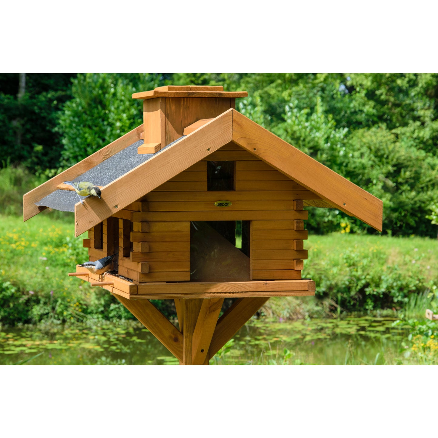 LUXUS-VOGELHAUS® Futterstation mit stabilem Standfuß und wetterfester Lasur, ideal für den Garten oder die Terrasse.