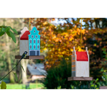 Buntes Vogelfutterhaus „Salzstraße“ – Farbiges Design im Münsterland-Stil mit reißfester Kordel.
